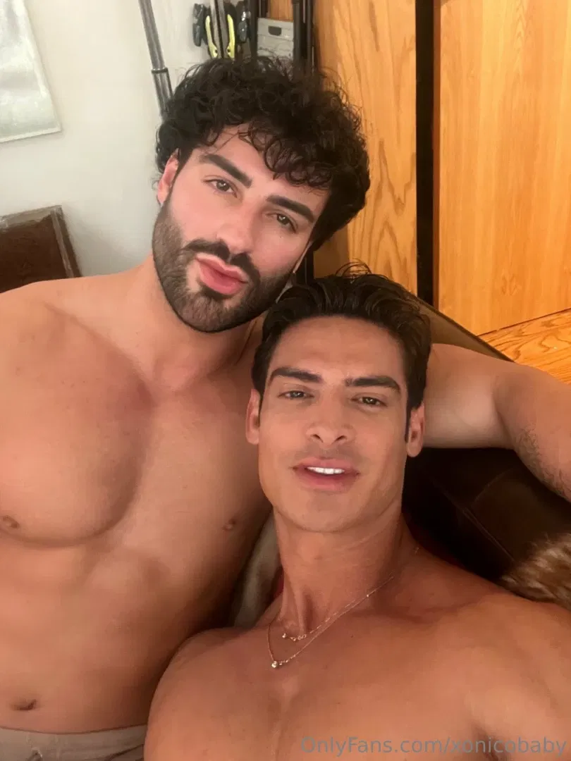 A woman posing seductively with her legs apart