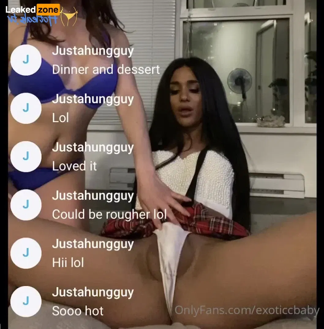 Kamila reclines provocatively on a bed of silky sheets