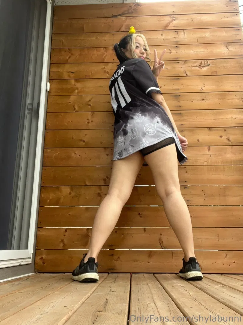 Shylabunni teasingCurvy figure displayedErotic reveal